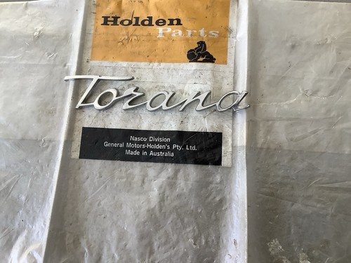 VINTAGE HOLDEN 1971 LC TORANA GENUINE NASCO SCRIPT GUARD~BOOT BADGE. P ...