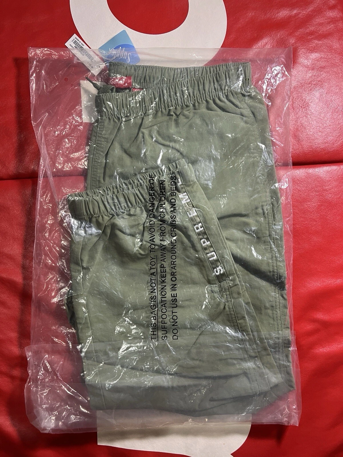 Pantalon d'échauffement Supreme Olive Medium SS22 NEUF SOUS BLISTER