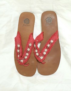 red yellow box flip flops