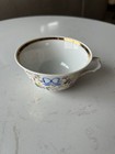 Porcelain teacup by Vista Alegre, handpainted with floral design and gold trim — photo 5