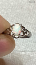  141B- .45ct Genuine Ethiopian Welo Opal set in a Size 6 Sterling Silver Ring