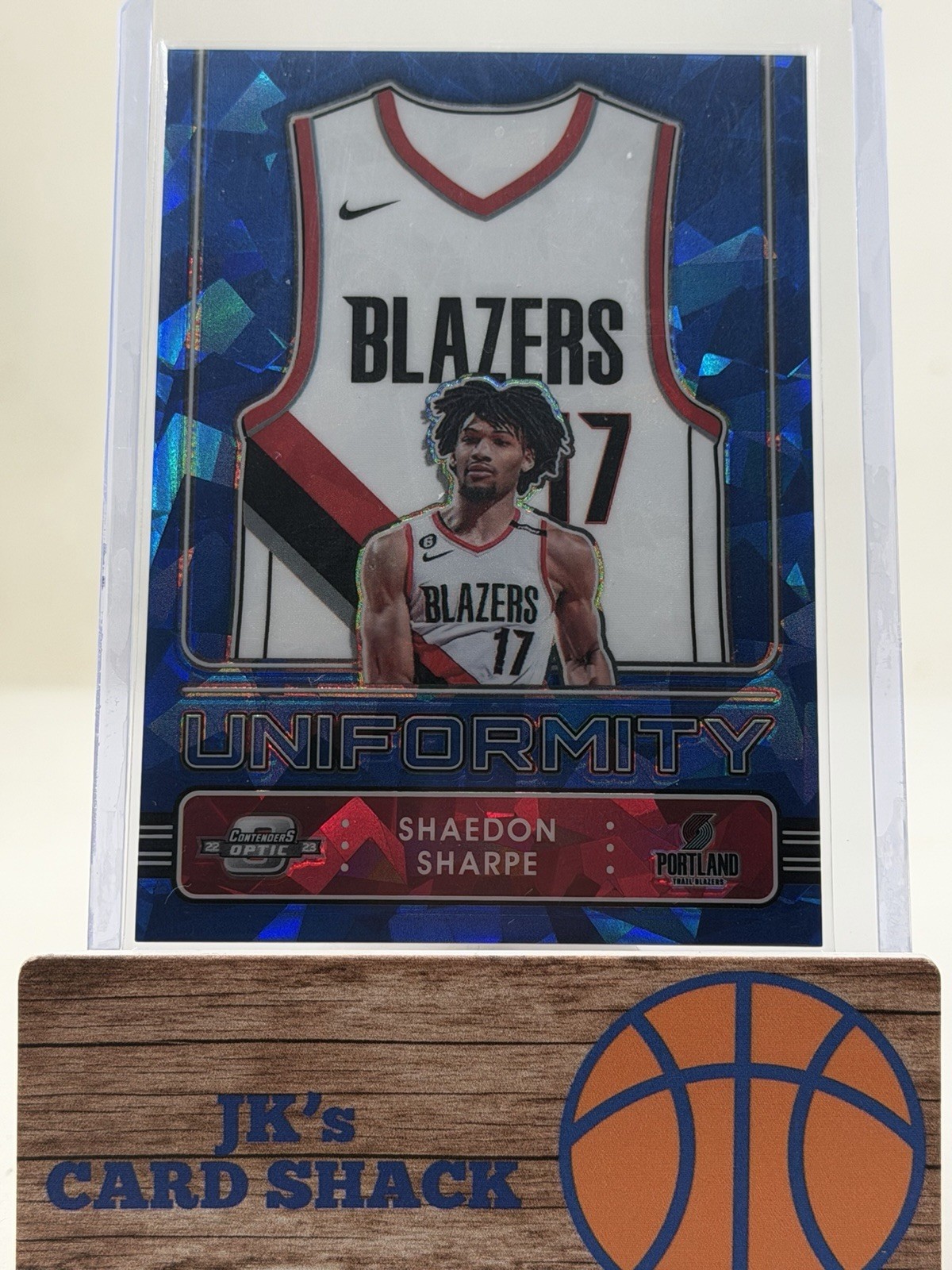2022-23 Panini Contenders Optic Shaedon Sharpe Uniformity Blue Ice /75 #29