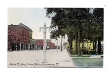 SYCAMORE, DEKALB COUNTY. IL ~ STATE STREET LOOKING WEST, STORES ~ 1910s