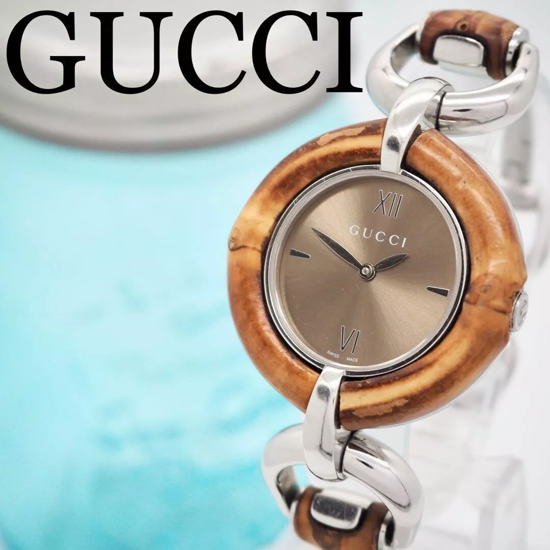 Montre femme GUCCI 132,4 quartz cadran marron analogique bambou ronde du Japon