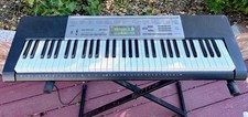 Electric Piano Casio LK-165, 61 light-up full size standard keys, with stand