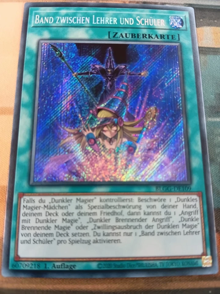 Band Zwischen Lehrer Und Schüler BLGG-DE109 Secret Rare DE NM Yugioh - Bild 1 von 1