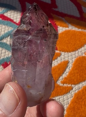 Zimbabwe super 7 Amethyst Crystal 67 Gram  Gas Bubbles With White Sand In It