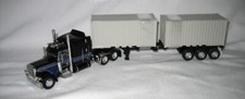 1/64thDCP 60-1927 389 Pete 63” Mid Roof Jet Black Two 20’Container 2nd In Series
