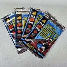 LOT OF 4 - 1994-95 Pinnacle Ser 1 NHL Canadian Edition Sealed Pack (14-cards/pk)