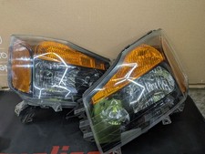 Depo Used 2008-2015 Nissan Titan Front Headlights Left Right Black Housing