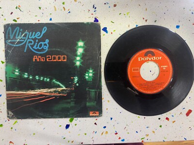 MIGUEL RIOS AÑO 2000 + A TUMBA ABIERTA SINGLE VINILO EXTRAIDO EXTRAÑOS ESCAPARAT