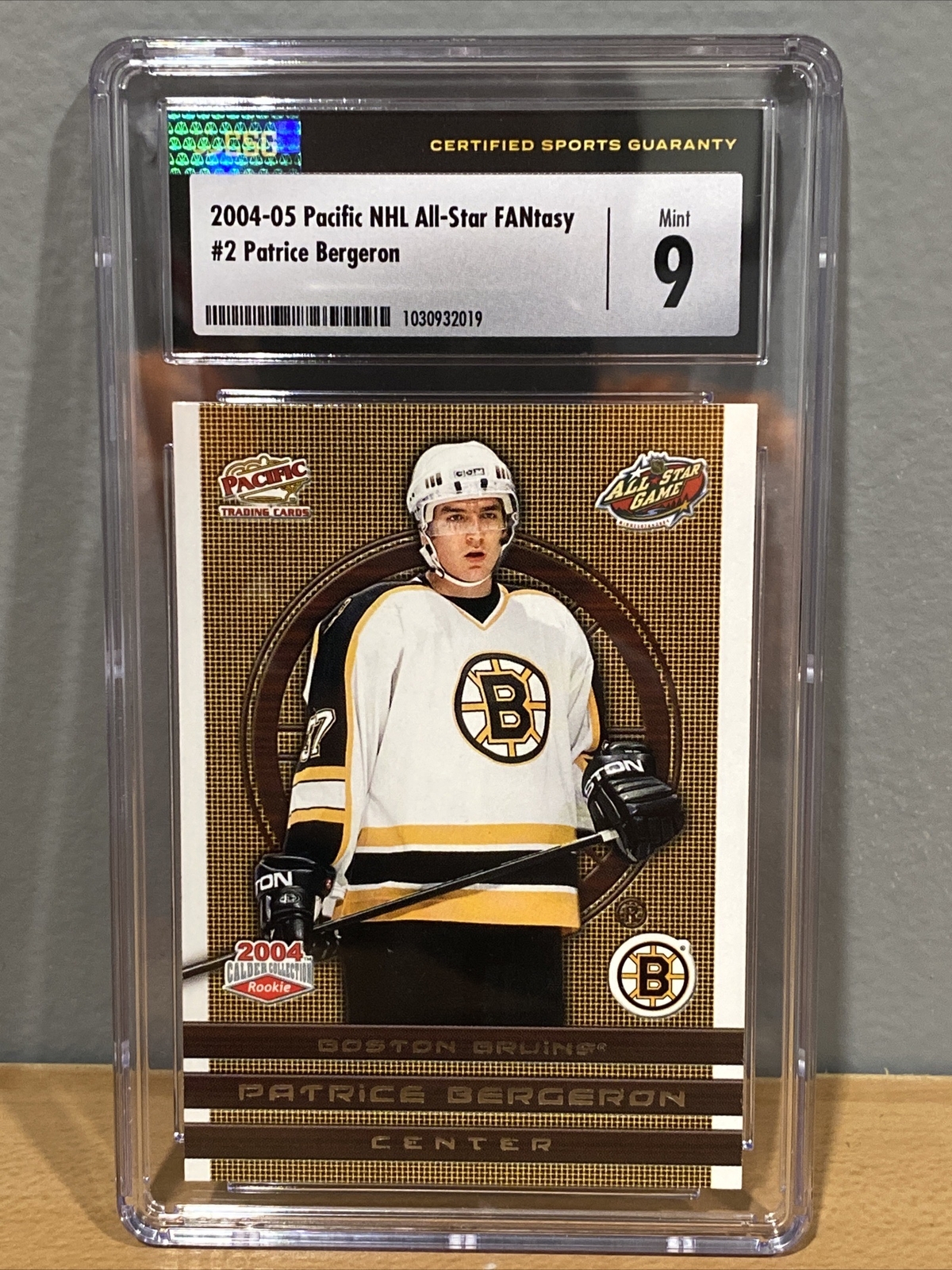 Patrice Bergeron 2004-05 Pacific NHL FANtasy #/1500 RC Boston Bruins GRADE CSG 9