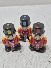 Lot of 3 Christmas Nutcrackers Wind up Toys Figures Holiday Xmas Nut Cracker