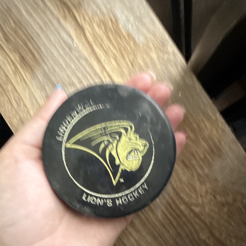 InGlasCo Lions Hockey ICSOHL Standard Ice Hockey Puck Rubber Black/Gold 6 oz