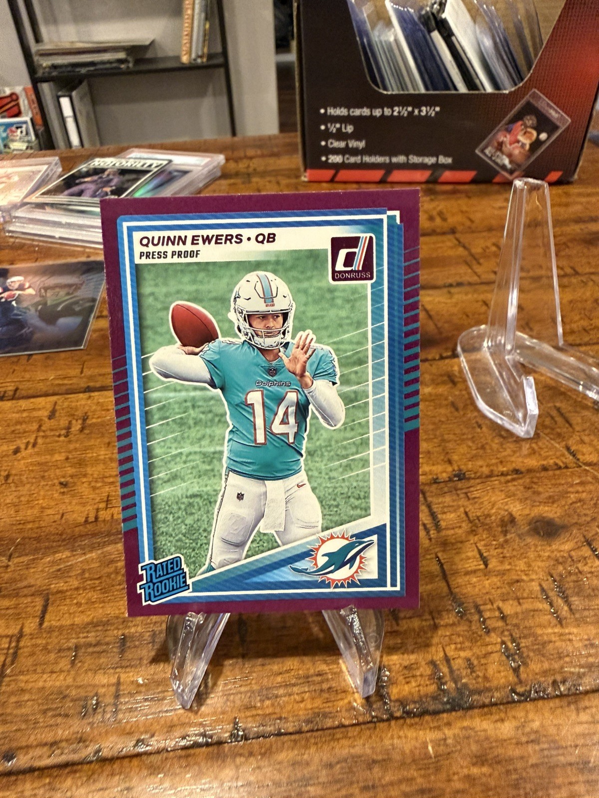 2025 Donruss Quinn Ewers Rated Rookie Press Proof Purple RC #342 Dolphins