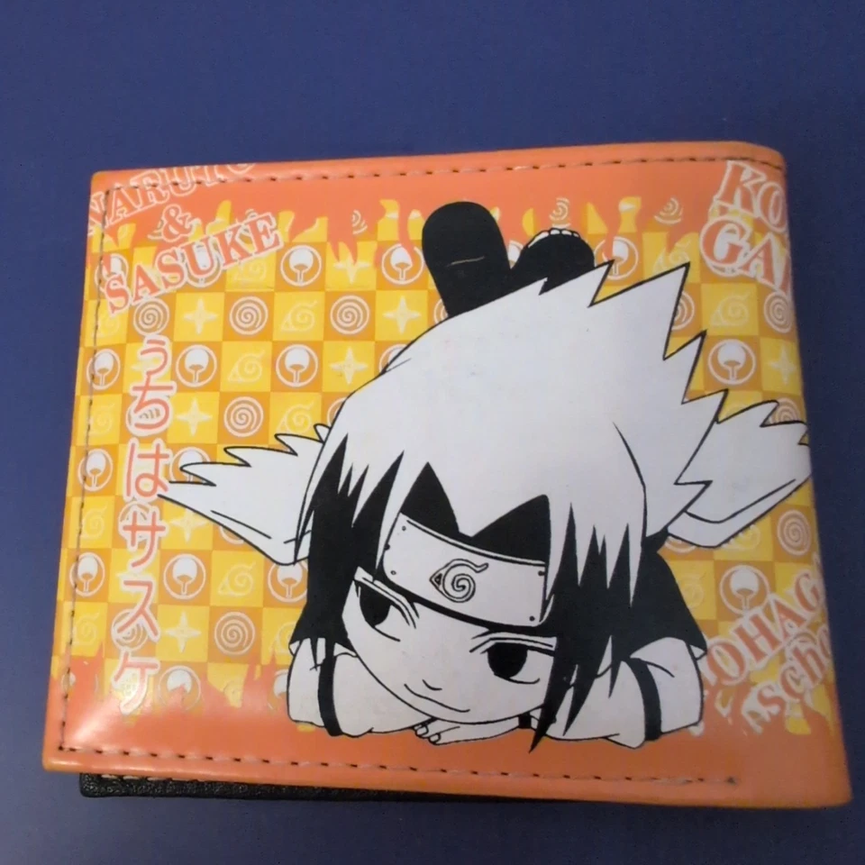 Cartera Bi Plegable Anime SASUKE & NARUTO 4x4.5" Naranja Amarillo Plisado Usada  Foto 2 de 4