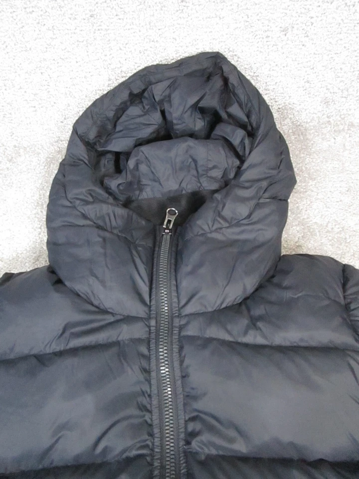 Chaqueta Under Armour Storm para mujer pequeña negra acolchada aislante Foto 2 de 4