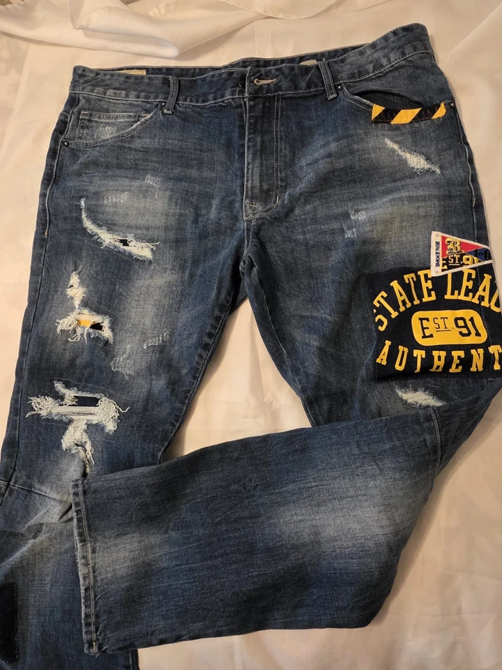 Pantalones de mezclilla azules desgastados con parche Smoke Rise con gráfico. 42x32 Flaco Foto 2 de 3