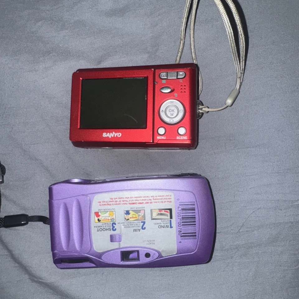 PAQUETE Cámara De Colección Antigua Funcionando, Piezas O Reparaciones Sanyo, Nikon, Ramon One!!!!! Foto 3 de 4