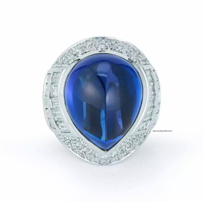 Stunning Pear Cabochon Shape 25.19CT Tanzanite With Fancy Cut CZ Fabulous Ring