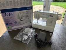 Brother L14 Domestic Sewing Machine used once in new condition needs re homing 