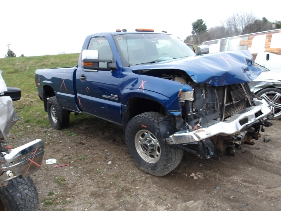 Asiento delantero central usado se adapta a: camioneta GMC Sierra 2500 2004 canastilla y banco Foto 2 de 4