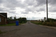 Photo 6x4 View along drive Ilketshall St Andrew The ubiquitous wheelie bi c2007