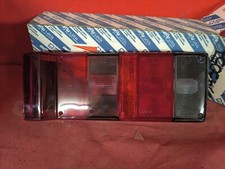TRASPARENTE FARO FANALE POSTERIORE DESTRO ORIGINALE LANCIA Y10 9943057 NUOVO