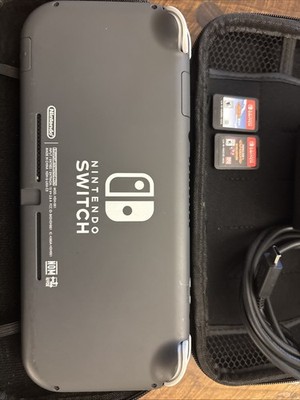 Nintendo Switch Lite HDH-001. Comes With Charger And Case. Comes