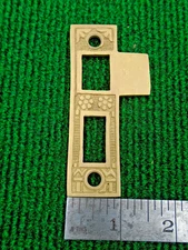 ONE AGED BRASS FINISH EASTLAKE 3 1/2" PASSAGE DOOR STRIKEPLATE- STYLE #1 (33010)