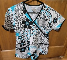 NWOT - UA SCRUBS BRAND SCRUB TOP WITH A CUTE FLOWER PRINT SIZE: X-SMALL
