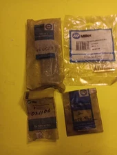 Miller Electric Parts 4 pack #115092,#021100,#058-462F,0623?? Woven Metal. 