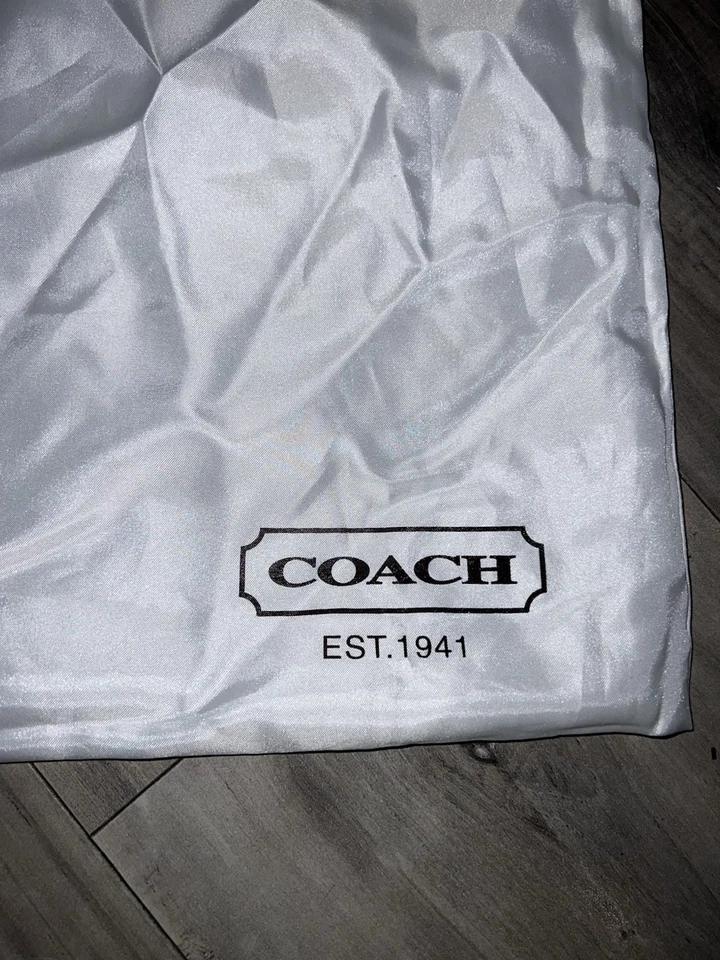 Cubierta para bolsa antipolvo Coach Foto 4 de 4