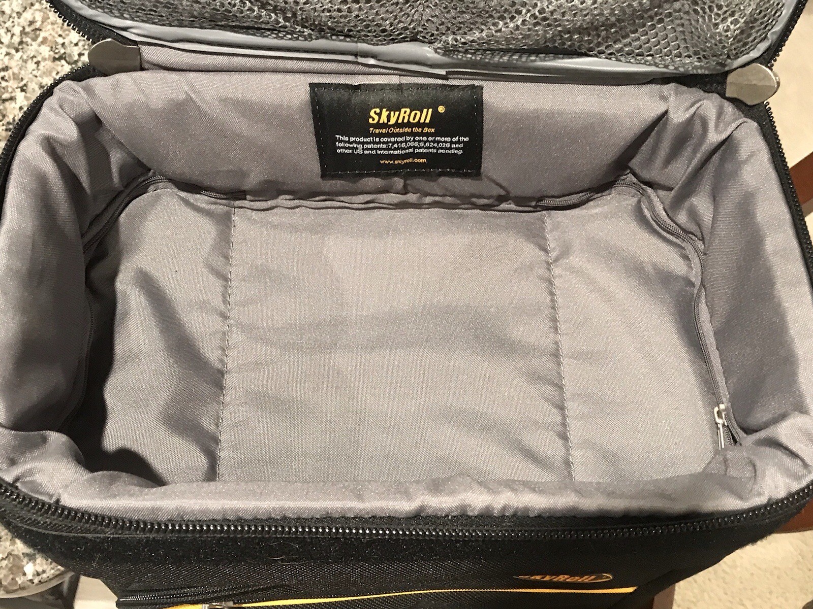 Sky Roll luggage with garment bag. 23 inch Carry On Bag. Sky Roll