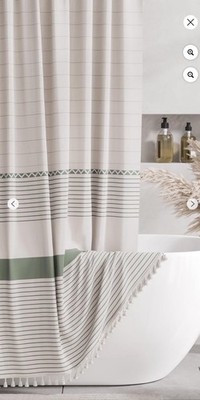 Boho shower curtain, beige with tassels and grommets.  Not sage as pic shows 