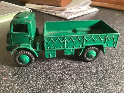 Dinky army wagon. Has some paint chips, but rolls well and has no other damage.
