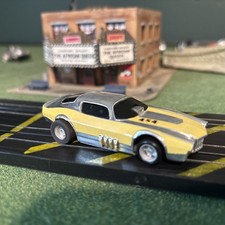 Tyco Chevy Camaro cream, chrome running chassis