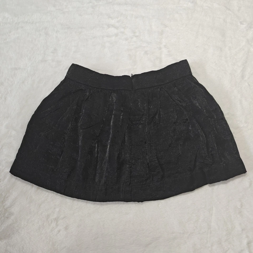 Minifalda Guess Talla 6 Niñas Niños Negra Dorada Brillante Metálica Logo Plisada Forrada Foto 3 de 4