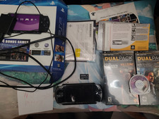 Sony PlayStation (PSP-3001) Charger, camera, 4 GB Memory stick & 7 psp games