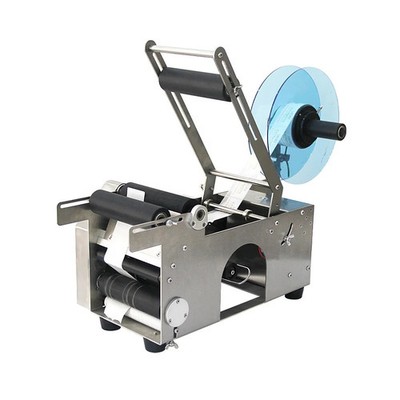 Semi automatic desktop labeling machine for canned glass and plastic bottles