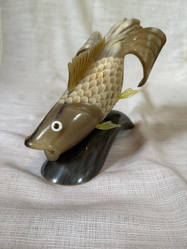 hand-carved koi fish figurine made from buffalo horn