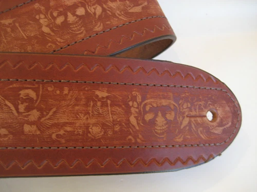 UNIQUE LEATHER BROWN ZIG ZAG AND SKULLS EMBOSS GUITAR/BASS STRAP