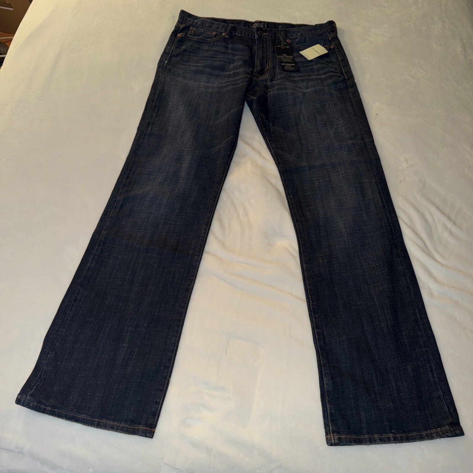 455 Relaxed Straight Leg Dark Blue Denim Distressed
