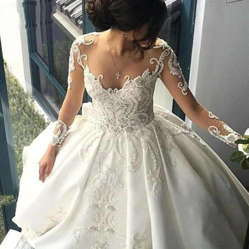 Vestidos de novia de satén de lujo mangas largas apliques de encaje tren de corte vestido de novia Foto 2 de 4