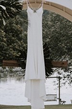 Preowned Mermaid wedding dress with flowy mesh