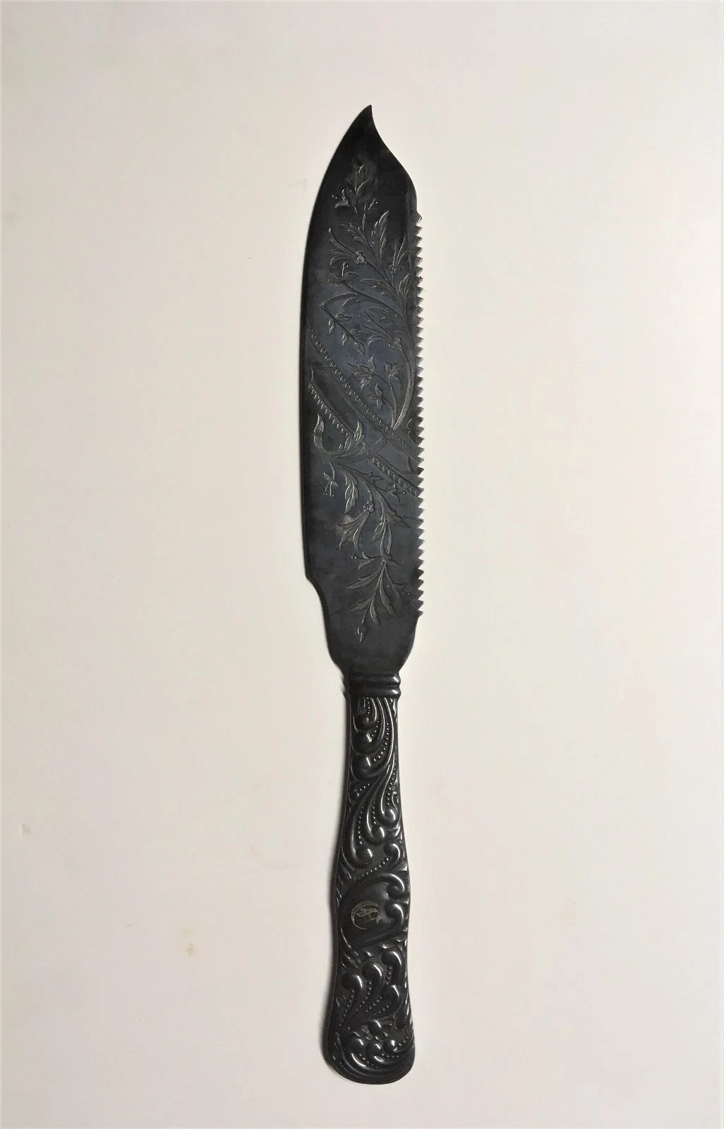 Antique silverplate serrated cake knife Rogers AA
