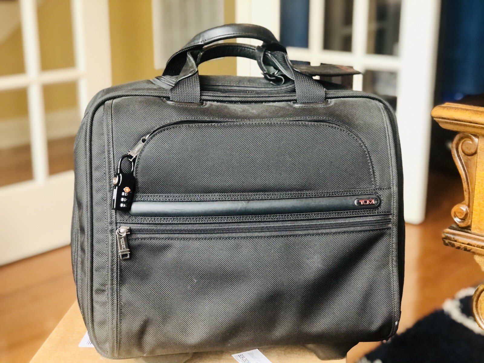 tumi triple compartment brief