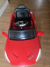 Mercedes-Benz SL65 12V electric ride-on car for children with remote control.