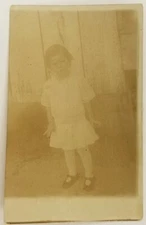 Rare Antique Vintage RPPC Real Photo Postcard Little Girl Standing By House