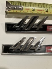 1964 Mercury Comet 404 Emblems